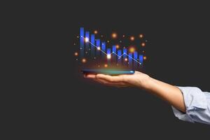 Digital increasing bar business graph growth on the palm with a black background photo