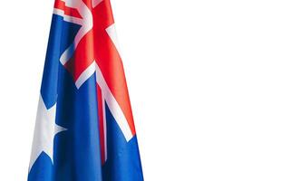 Close-up of the Australian flag is on the left side on a white background photo