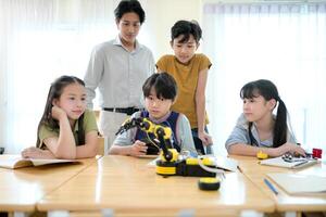 STEM Class, Teacher and students in basic engineering classroom photo