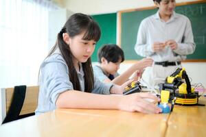 STEM Class, Teacher and students in basic engineering classroom photo