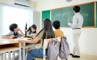 STEM Class, Teacher and students in basic engineering classroom photo