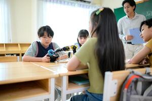 STEM Class, Teacher and students in basic engineering classroom photo