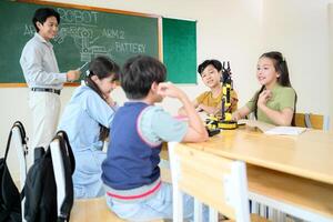 STEM Class, Teacher and students in basic engineering classroom photo