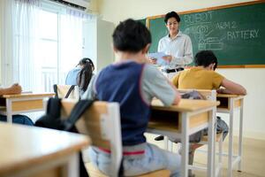 STEM Class, Teacher and students in basic engineering classroom photo