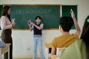 Presentation lesson, Teacher and students in the basic presentation in front of class photo