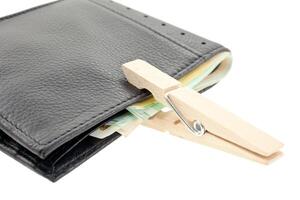 wallet with euro notes keeped with a pin photo