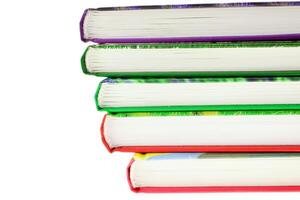multicolored books stack isolated photo
