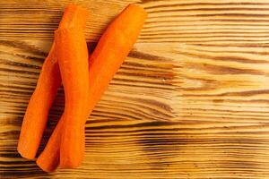 Vegan healthy eating concept, peeled carrots for a tasty and healthy breakfast photo