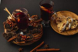 Warm fresh mulled wine with spices for a festive winter evening photo