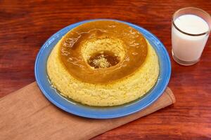 Milk ans eggs Pudding or Pudim de leite. Brazilian dessert homemade caramel custard pudding. Traditional brazilian flan photo