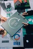Carbon offset price report CO2 emission. Future growth Net zero waste in ESG ethical SME office protect climate change global warming social issues project. Group of asia people Eco friendly SDGs plan photo