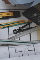Construction and structure concept of Engineer or architect meeting for project working with partner and engineering tools on model building and blueprint in working site, contract for both companies. photo
