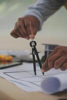 Image of engineer meeting for architectural project. working with partner and engineering tools on workplace vintage tone. photo
