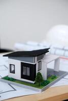 Architects, engineers, contractors working in the office with blueprints, inspection engineers Work analysis for architectural plan, construction project sketch, focus, business construction concept. photo