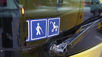 Enhancing accessibility with yellow checkerboard symbols for public transportation icon display video