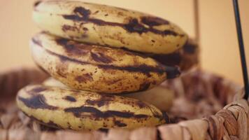 Freshly Ripened Bananas Arranged in a Beautifully Woven Rustic Basket for Enjoyment video