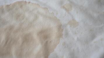An Elegant Swirl of Soft White Fabric Enhanced by Subtle and Intriguing Color Stains video