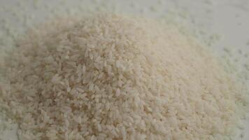 A CloseUp Image Showing White Rice Grains Neatly Arranged in a Pile video