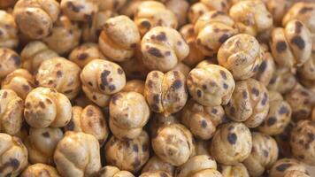 Close-Up View of Roasted Chickpeas Displaying Toasted Texture and Crunchiness video