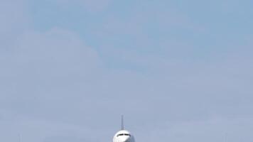 Passenger carrier approaching landing. Airliner flying overhead. Travel concept video