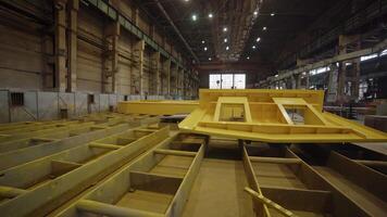 Inside a detailed Shipbuilding Facility featuring various Assembled Hull Sections and more. Stock Clip video