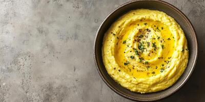 Dip in a wide, shallow bowl shown from above, with minimalistic presentation, food photography photo
