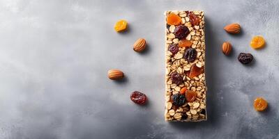 Fruit and nut bar with dried fruits and nuts on a flat surface, photorealistic food photo
