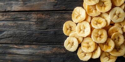 Close-up of banana chips in a small, uneven pile, meal photography photo