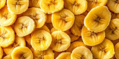 Small pile of banana chips in an irregular pattern, meal photography photo
