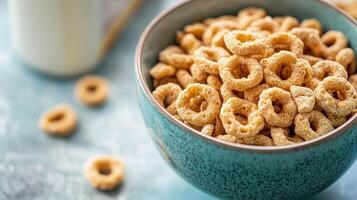 Close-up view of cold cereal pieces in a bowl with milk carton behind, meal photography photo