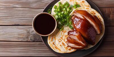 Peking duck with scallions and hoisin sauce, meal photography photo