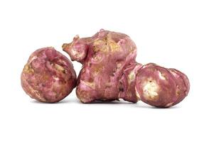 Close-Up of Fresh Jerusalem Artichokes on White Background photo