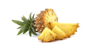 Close-Up of Fresh Pineapple Slices on White Background photo