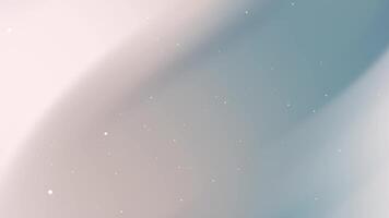 soft pastel gradient background with subtle light specks. video