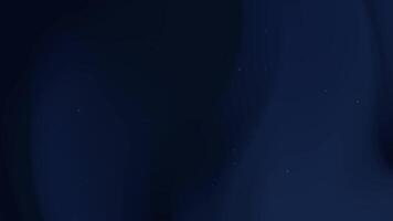 Dark blue background features faint light points resembling stars. video