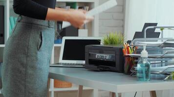 Organizing a modern office workspace with effective desk setup tips and efficient printer usage for productivity video