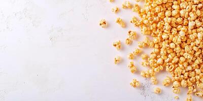 Caramel corn scattered on a flat surface, with coated popcorn kernels visible, photorealistic food photo