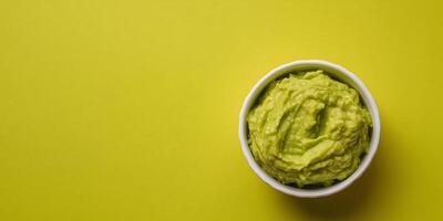 Close-up of guacamole in a small ramekin, no extra elements, meal photography photo