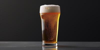 Clear glass of craft beer with visible carbonation and a frothy head, culinary photography photo
