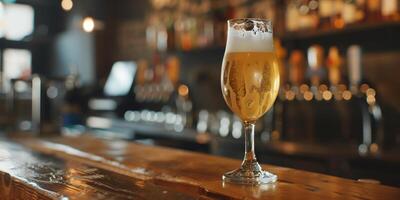 Clear glass of pale ale on a bar counter, bubbles rising steadily, meal photography photo