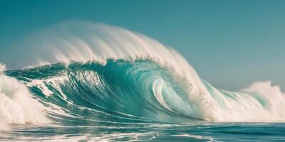 A large wave crashes in the ocean on a sunny day. photo