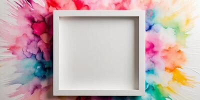 Blank white square frame on colorful abstract watercolor background. photo