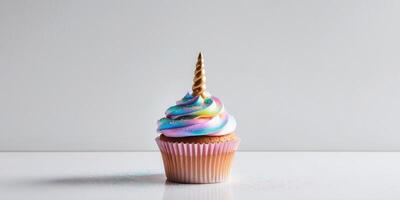 Enchanting unicorn themed cupcake with colorful iridescent frosting and shimmering edible glitter creating a whimsical magical treat for any or dessert lover. photo