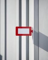 red big blank label tag in the center of the building. photo