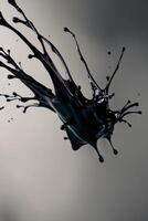 bold black liquid splash swirling gracefully creating striking visual impact. photo