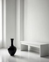 A white room with a black vase and a white bench. photo