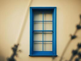 A window with a blue frame and a yellowish tint. photo
