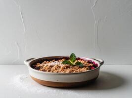 Delicious Fruit Crumble Made in a Ceramic Dish. photo