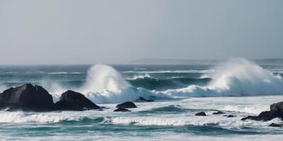 Rugged coastline with crashing waves scenic ocean views. photo