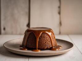 Rustic Sticky Toffee Pudding with Caramel Glaze. photo